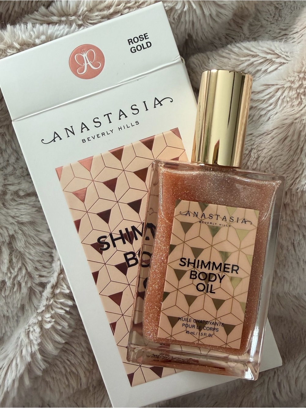 Anastasia Beverly Hills Rose Gold Shimmer Body Oil Bottle